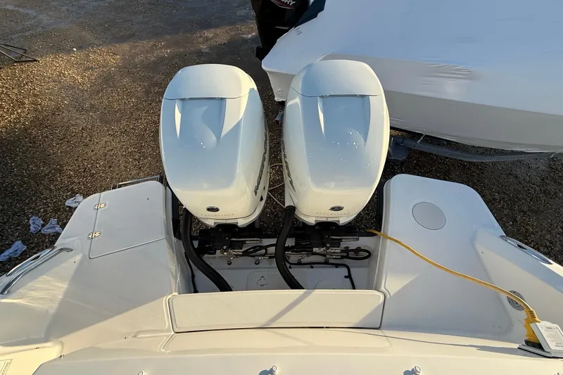  Yacht Photos Pics 2017 Boston Whaler 320 Vantage with dual outboard engines, viewed from above.