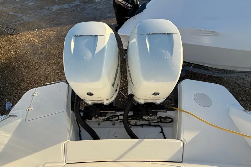  Yacht Photos Pics 2017 Boston Whaler 320 Vantage with dual Mercury outboard engines, viewed from above.