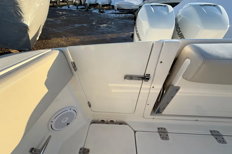  Yacht Photos Pics 2017 Boston Whaler 320 Vantage boat interior with seating and Mercury engines.