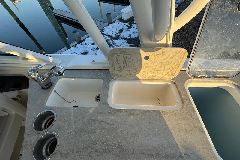  Yacht Photos Pics 2017 Boston Whaler 320 Vantage boat sink and countertop with marina view.
