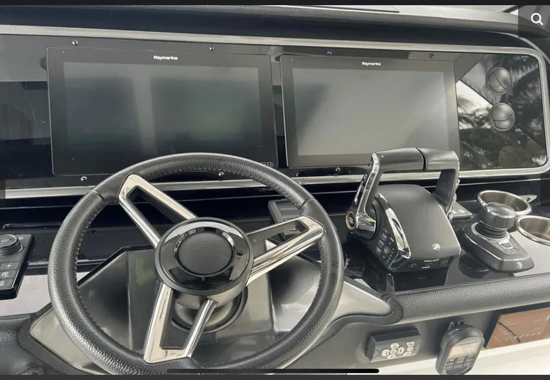  Yacht Photos Pics Cockpit of 2022 Azimut Verve 42 with dual Raymarine displays and modern controls.