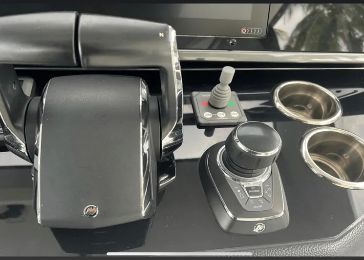  Yacht Photos Pics Control panel of 2022 Azimut Verve 42 yacht with throttle and joystick.