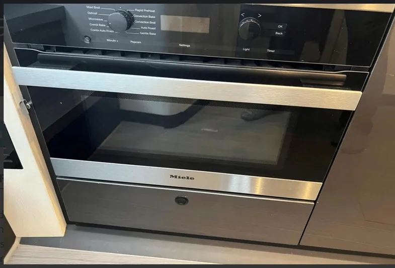  Yacht Photos Pics Modern Miele oven in 2022 Azimut Verve 42 yacht kitchen.