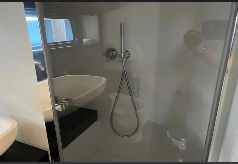  Yacht Photos Pics Bathroom interior of 2022 Azimut Verve 42 yacht with modern fixtures.