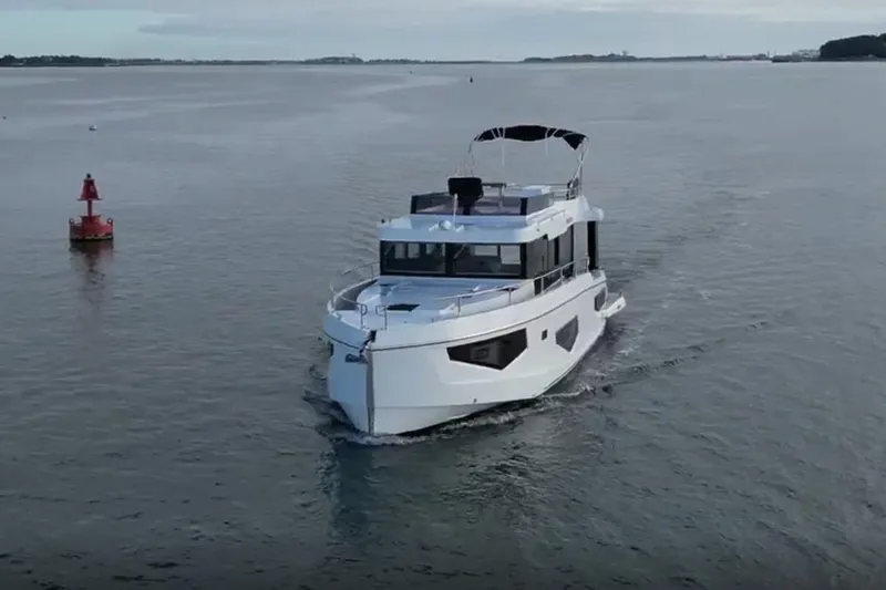 Your New Boat Yacht Photos Pics 2026 Cobra Yachts Seamaster 45 cruising on open water, showcasing sleek design and modern features.