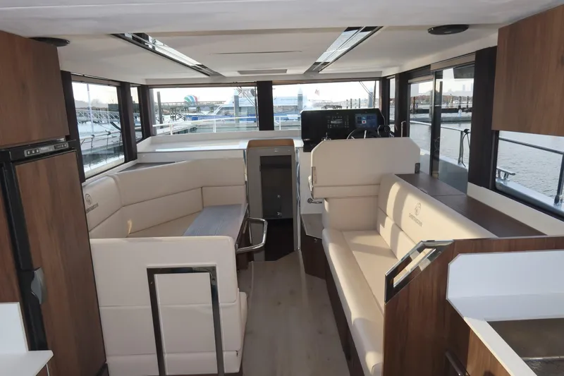Your New Boat Yacht Photos Pics Luxurious interior of 2026 Cobra Yachts Sea Master 45 with modern seating and helm.