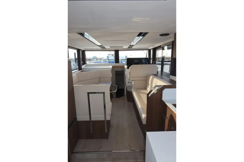 Your New Boat Yacht Photos Pics Luxurious interior of 2026 Cobra Yachts Sea Master 45 with modern seating and panoramic windows.