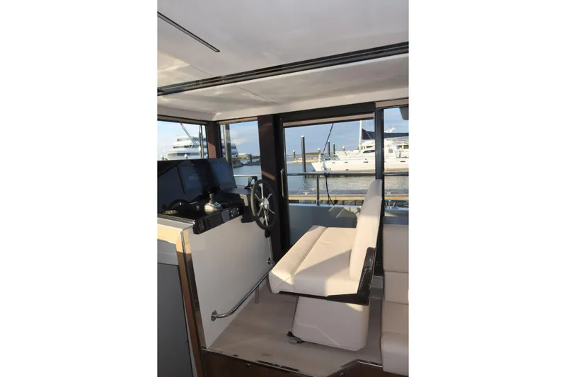 Your New Boat Yacht Photos Pics Interior of 2026 Cobra Yachts Sea Master 45, featuring helm and seating area.