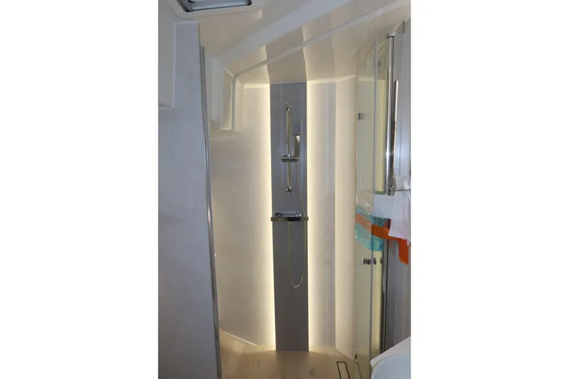 Your New Boat Yacht Photos Pics Modern shower area in 2026 Cobra Yachts Sea Master 45, featuring sleek design and ambient lighting.