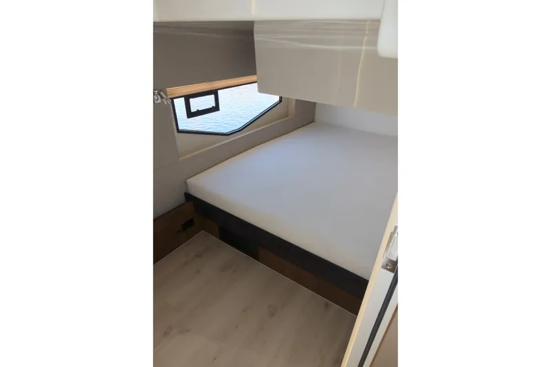Your New Boat Yacht Photos Pics Interior cabin of 2026 Cobra Yachts Sea Master 45 with bed and window view.