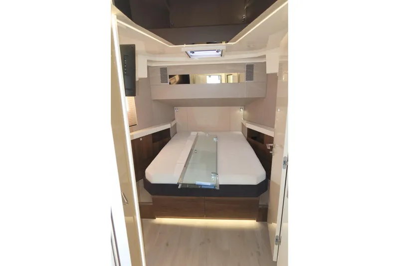 Your New Boat Yacht Photos Pics Luxurious interior cabin of 2026 Cobra Yachts Sea Master 45, featuring modern design and comfortable bedding.