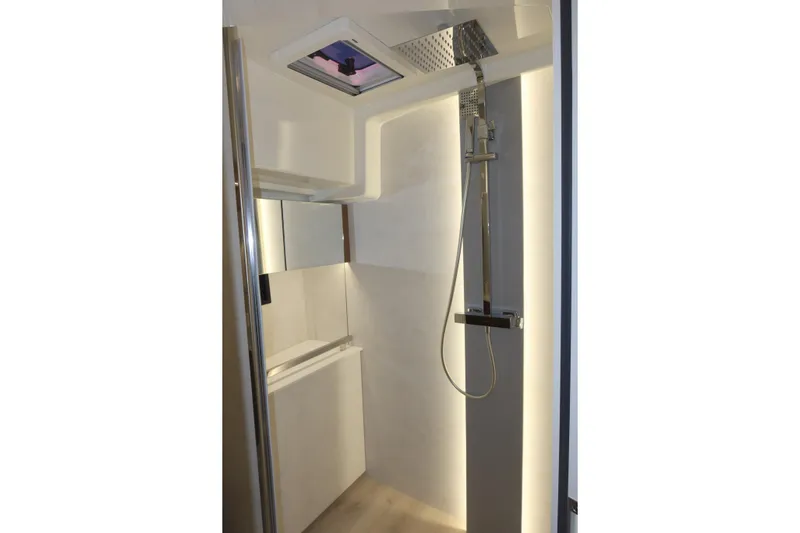 Your New Boat Yacht Photos Pics Modern shower area in 2026 Cobra Yachts Sea Master 45, featuring sleek design and lighting.