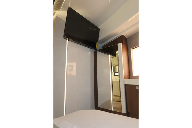 Your New Boat Yacht Photos Pics Interior of 2026 Cobra Yachts Sea Master 45 with mounted TV and modern design.