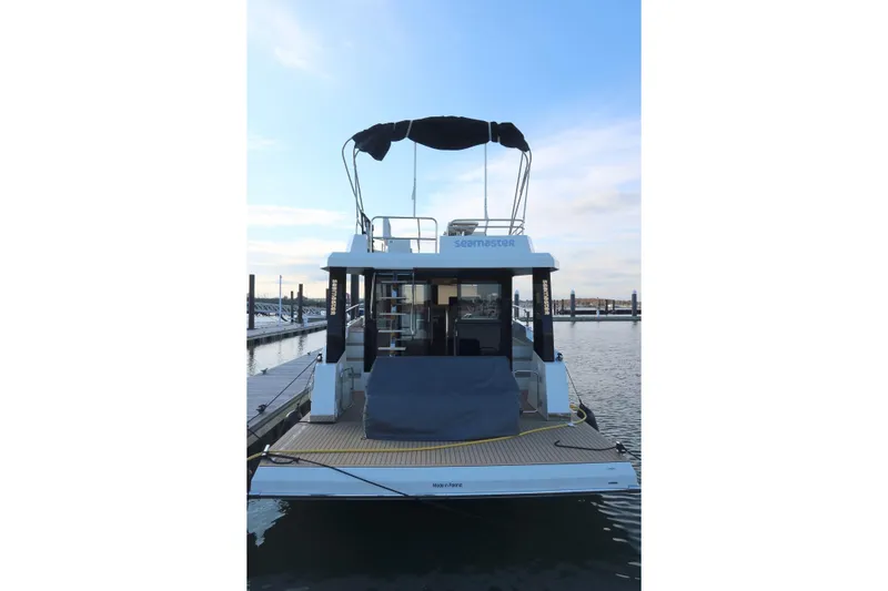 Your New Boat Yacht Photos Pics Cobra Yachts Sea Master 45, 2026 model, docked at marina with clear sky.