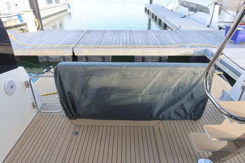 Your New Boat Yacht Photos Pics Cobra Yachts Sea Master 45, 2026 model, docked with covered seating area.