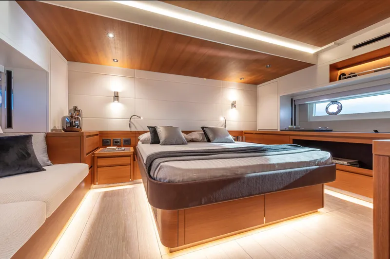  Yacht Photos Pics Luxurious interior of 2026 Pardo Yachts E60, featuring modern bedroom design and ambient lighting.