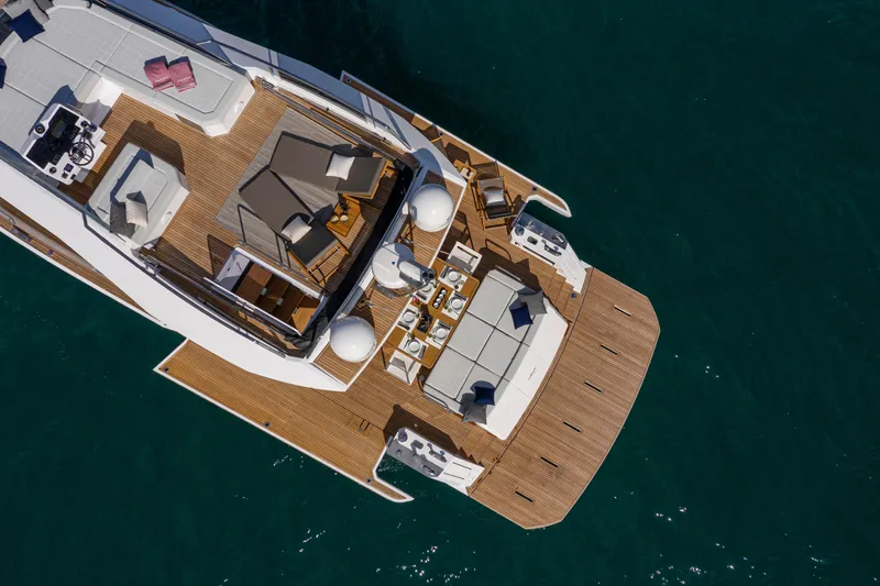  Yacht Photos Pics Aerial view of 2026 Pardo Yachts E60 luxury yacht with spacious deck and seating areas.