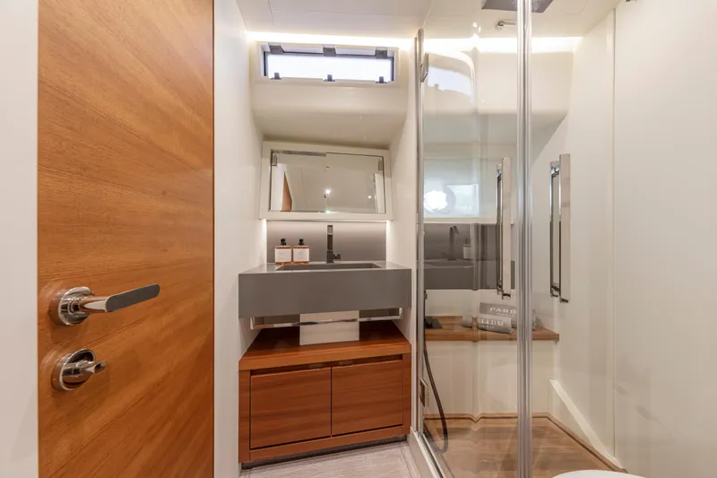  Yacht Photos Pics Modern bathroom interior on 2026 Pardo Yachts E60, featuring sleek design and wooden accents.