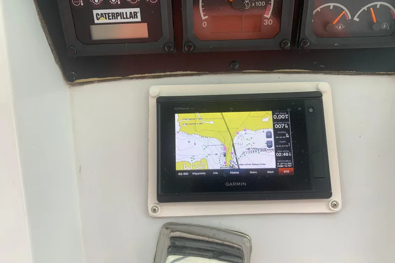  Yacht Photos Pics Garmin GPS display on 1999 Hatteras 52 Cockpit Motor Yacht dashboard.