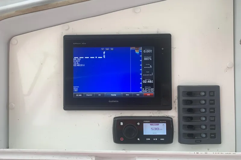  Yacht Photos Pics Garmin GPS display and control panel on 1999 Hatteras 52 Cockpit Motor Yacht.