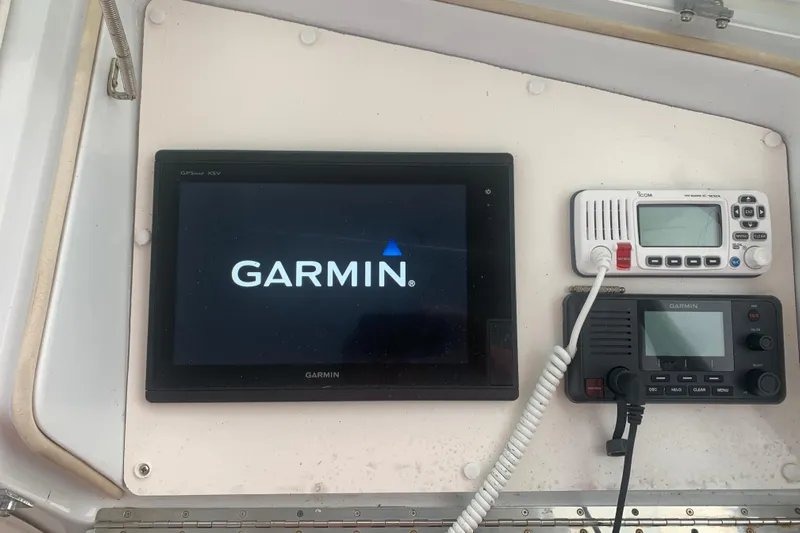  Yacht Photos Pics Garmin navigation system on 1999 Hatteras 52 Cockpit Motor Yacht dashboard.