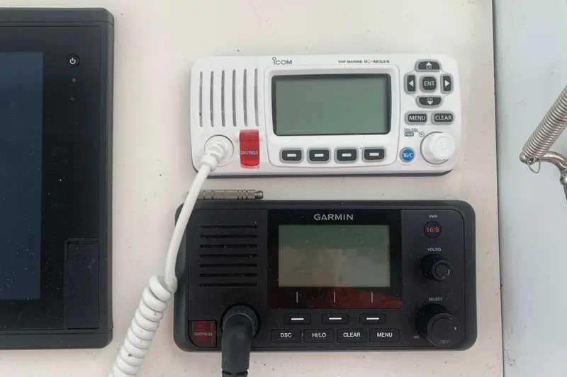  Yacht Photos Pics VHF marine radios on a 1999 Hatteras 52 Cockpit Motor Yacht dashboard.