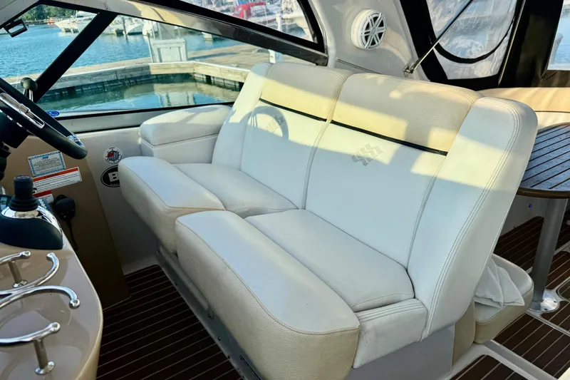 Fresh Off The Boat Yacht Photos Pics 2008 Four Winns 378 Vista boat interior with white seating and wooden accents.