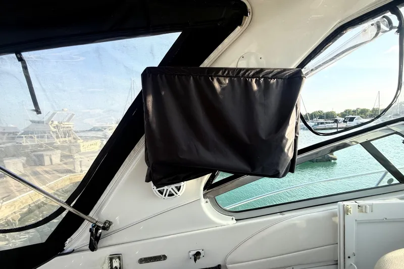 Fresh Off The Boat Yacht Photos Pics Interior view of 2008 Four Winns 378 Vista boat with covered window and marina background.