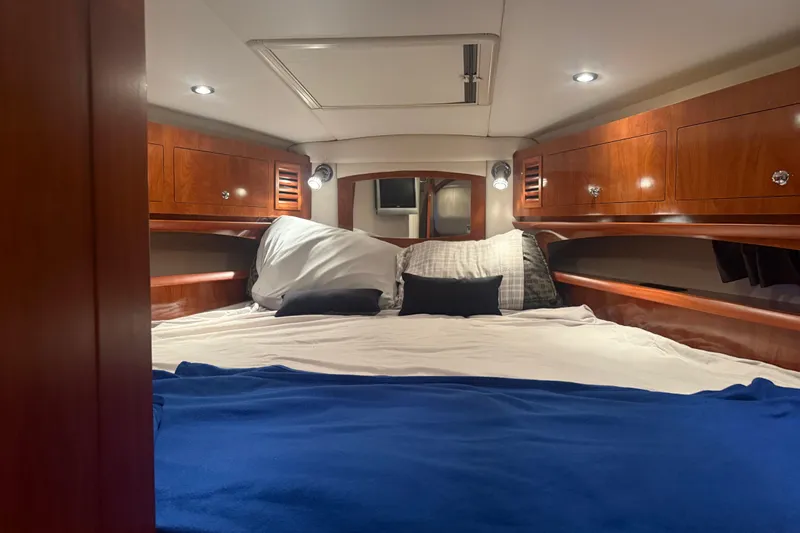 Fresh Off The Boat Yacht Photos Pics Luxurious cabin interior of 2008 Four Winns 378 Vista yacht with cozy bedding.