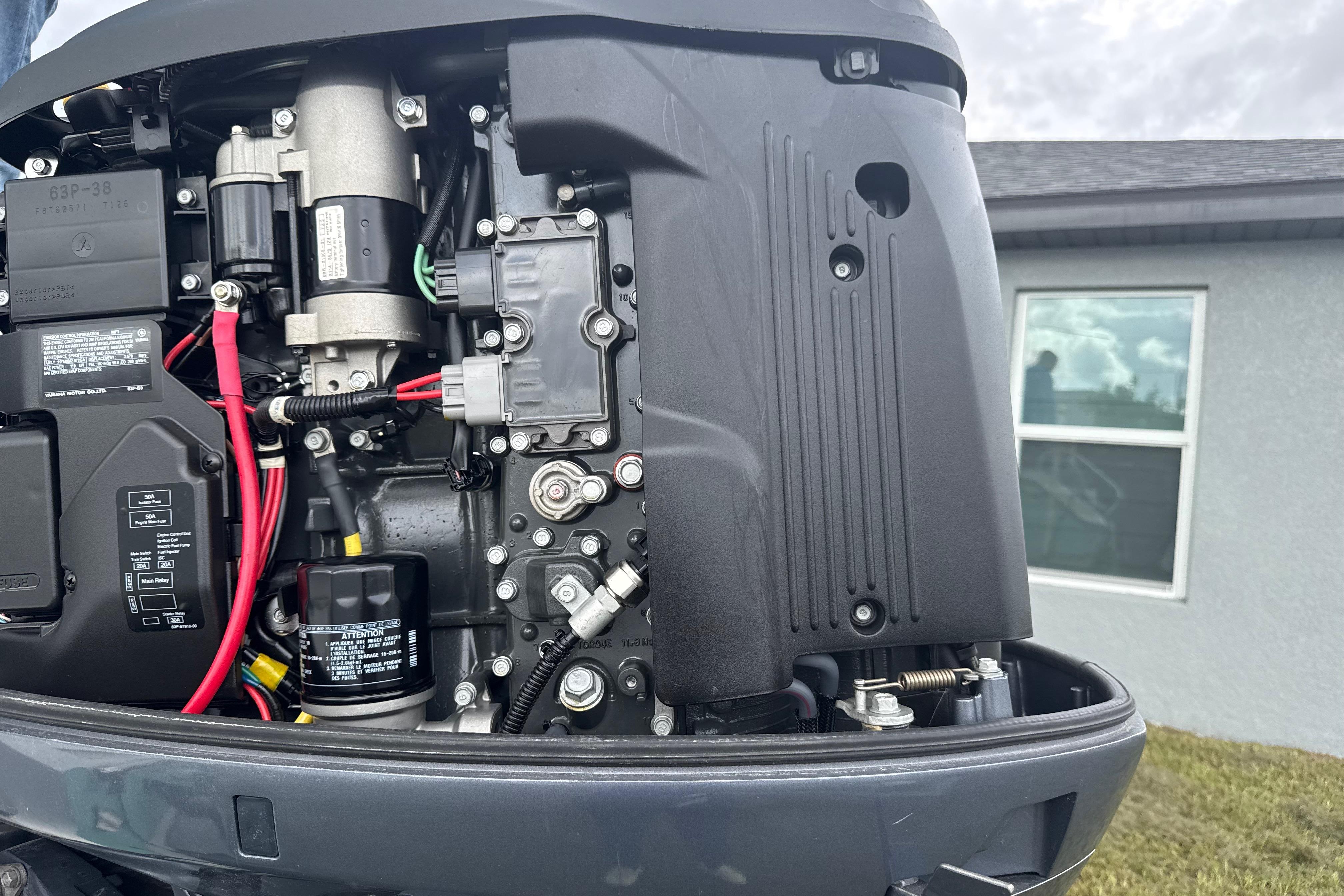 Close-up of a 2018 Release 208 RX engine with visible components and wiring.