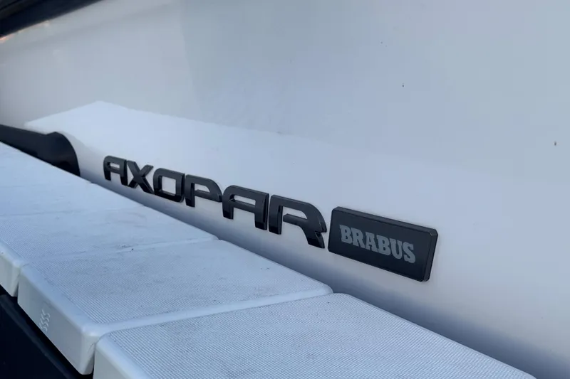 Axopar 37 Suntop Yacht Photos Pics 2024 Axopar 37 SunTop boat with Brabus branding on the side.