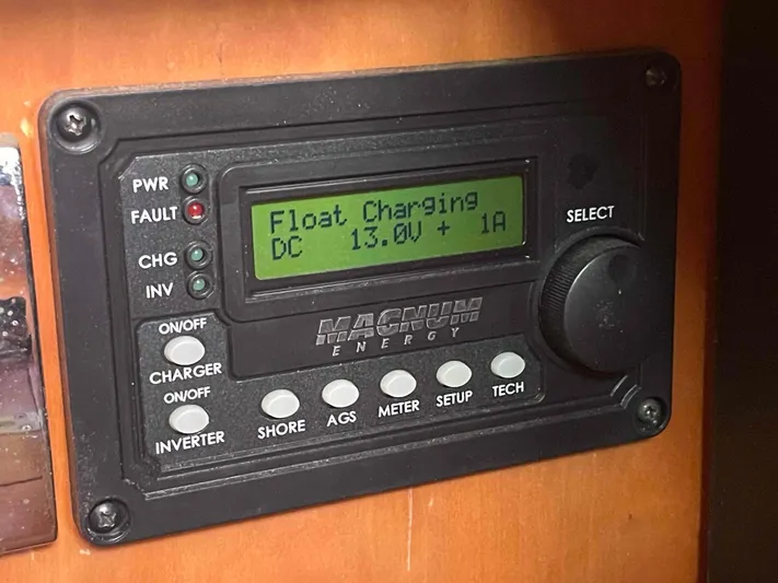 Gratitude Yacht Photos Pics Control panel displaying "Float Charging" at 13.0V and 1A on a Moody 46 CC yacht.