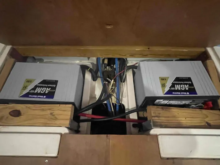 Gratitude Yacht Photos Pics Battery compartment of a 1999 Moody 46 CC sailboat with AGM batteries.