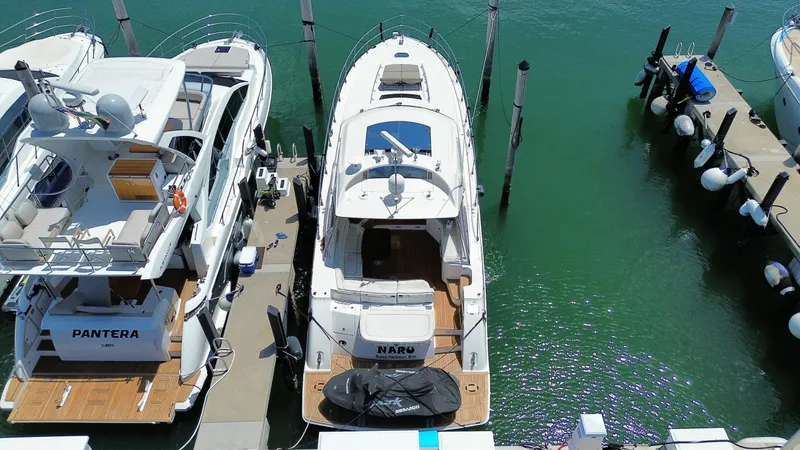  Yacht Photos Pics 2010 Sea Ray 540 Sundancer yacht docked at marina, aerial view.