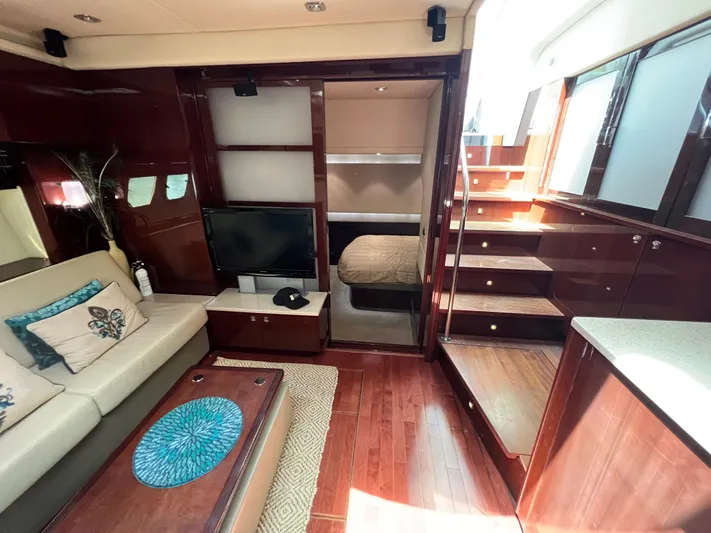  Yacht Photos Pics Luxurious interior of 2010 Sea Ray 540 Sundancer yacht with elegant wood finishes.