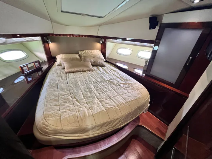  Yacht Photos Pics Luxurious cabin interior of 2010 Sea Ray 540 Sundancer yacht with elegant bedding.