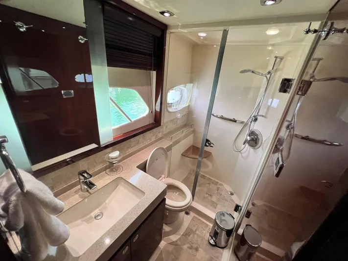  Yacht Photos Pics Luxurious bathroom in 2010 Sea Ray 540 Sundancer yacht with modern fixtures and shower.