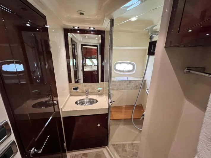  Yacht Photos Pics Luxurious bathroom in 2010 Sea Ray 540 Sundancer yacht with modern fixtures and shower.