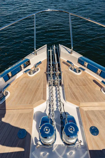  Yacht Photos Pics Bow view of 2023 Ferretti Yachts 860, showcasing anchor chains and teak deck.