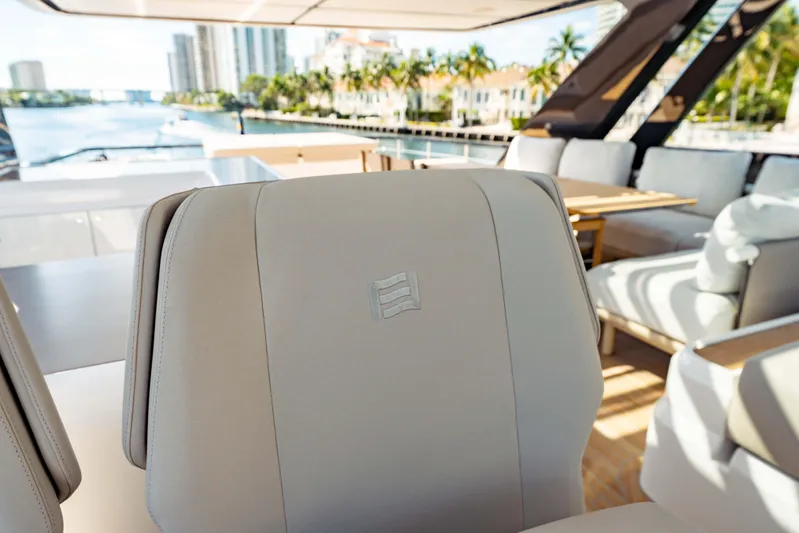  Yacht Photos Pics Luxurious interior of 2023 Ferretti Yachts 860, featuring elegant seating and scenic waterfront view.