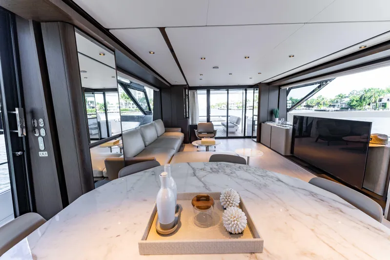  Yacht Photos Pics Luxurious interior of 2023 Ferretti Yachts 860, featuring elegant furnishings and modern design.