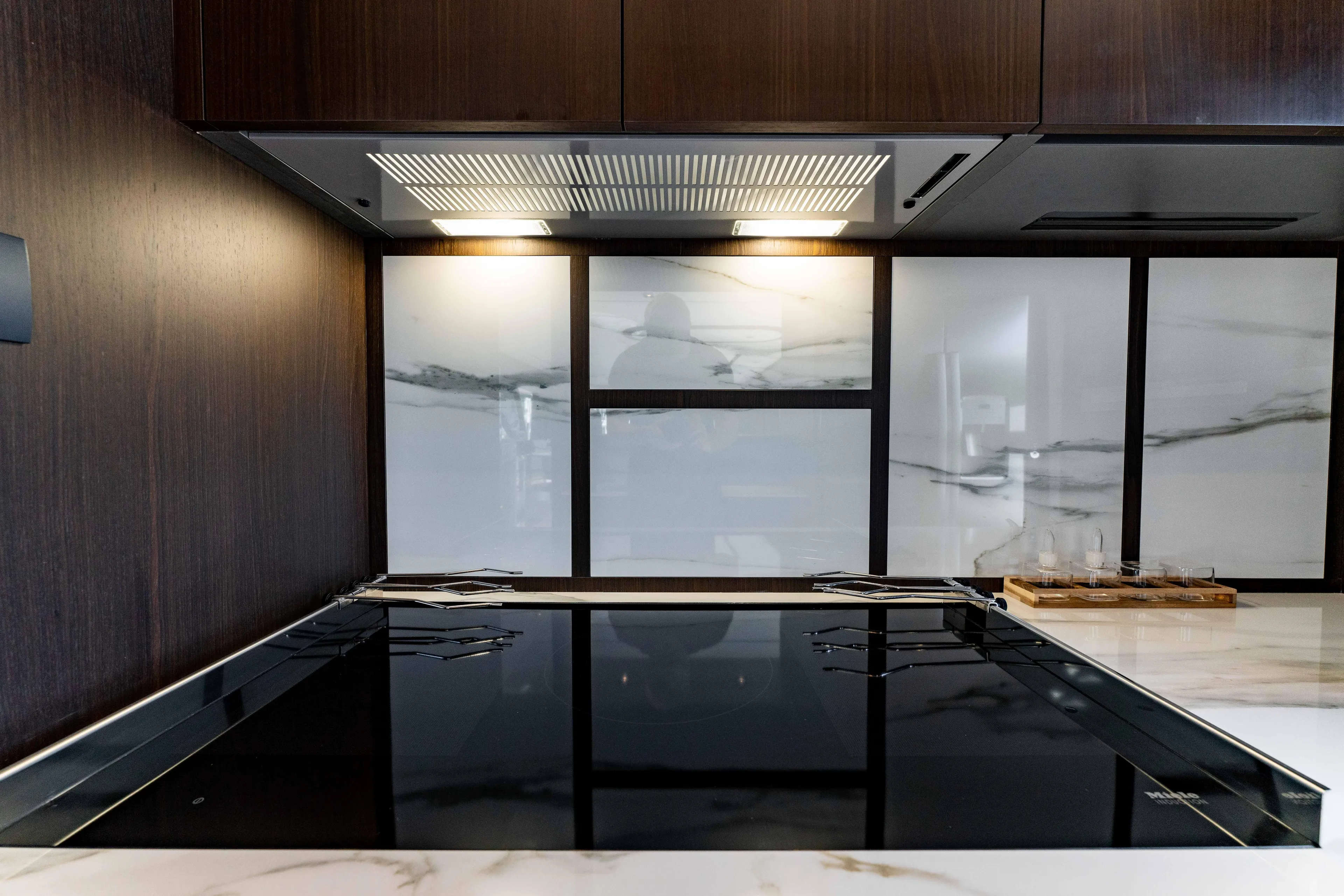  Yacht Photos Pics Modern kitchen interior on 2023 Ferretti Yachts 860, featuring sleek design and marble accents.