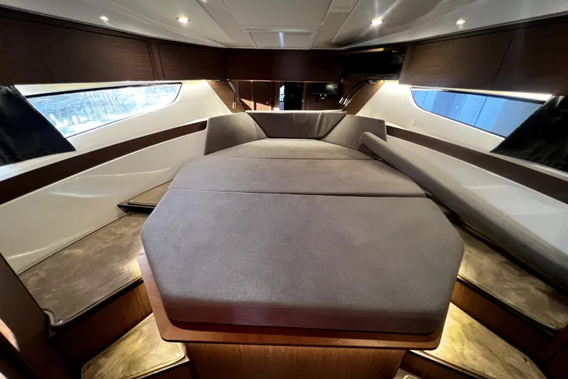  Yacht Photos Pics Luxurious interior cabin of 2023 Beneteau Antares 11 Fly yacht, featuring elegant design and comfortable seating.