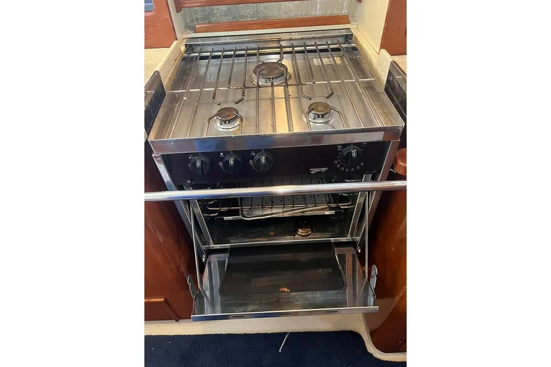  Yacht Photos Pics Stainless steel stove and oven in 2005 Island Packet 485 yacht kitchen.