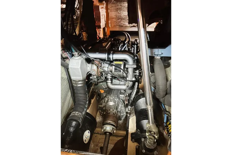  Yacht Photos Pics Engine compartment of a 2005 Island Packet 485 sailboat, showcasing mechanical components.