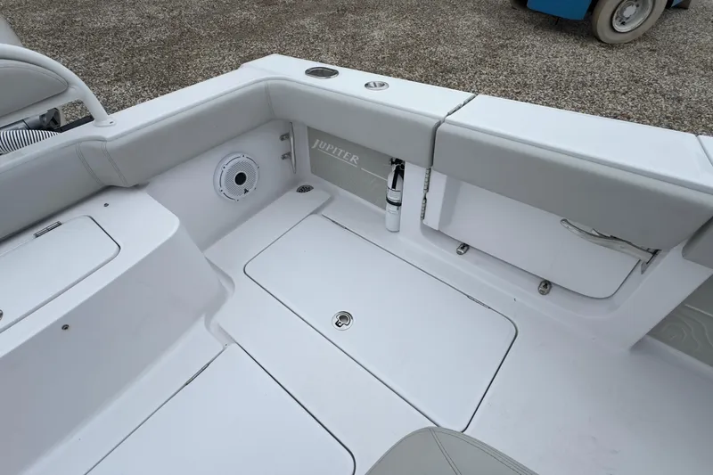  Yacht Photos Pics 2024 Jupiter 32 FS boat interior with seating and storage compartments.