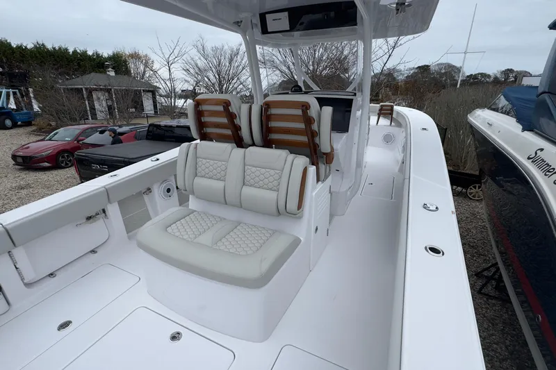  Yacht Photos Pics 2024 Jupiter 32 FS boat with luxurious seating and sleek design.