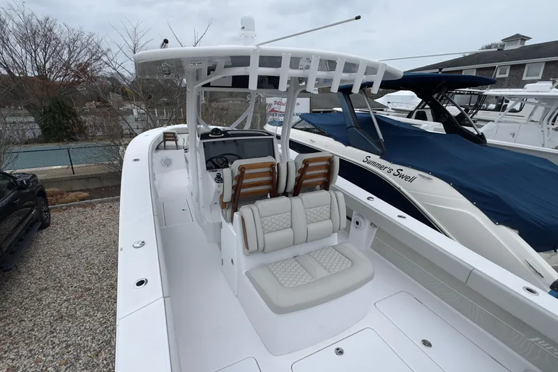  Yacht Photos Pics 2024 Jupiter 32 FS boat with sleek design and comfortable seating.