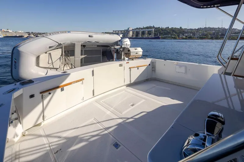 La Paz Yacht Photos Pics 1993 Tollycraft 40 Sport Sedan yacht deck with scenic waterfront view.