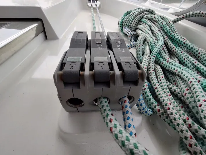 Seeker Yacht Photos Pics Close-up of rope clutches and colorful ropes on a 2005 Stevens Custom 53/56 sailboat.